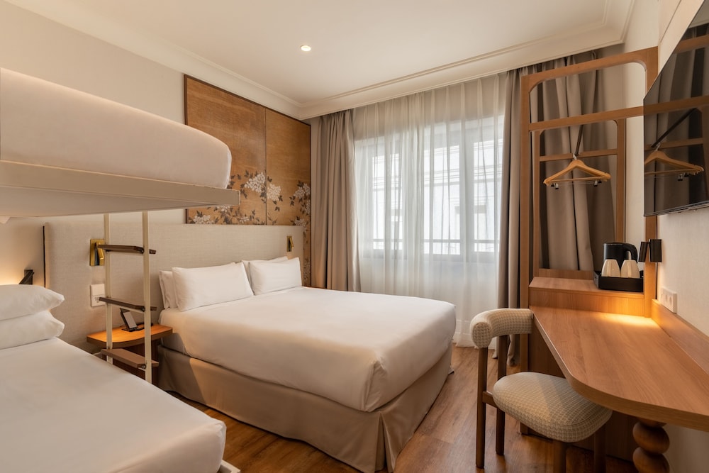 Habitación Cuádruple del hotel Petit Palace Cliper. Foto 1