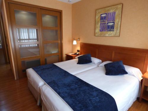 Habitación Doble con cama supletoria - 2 camas del hotel Eco Via Lusitana. Foto 2