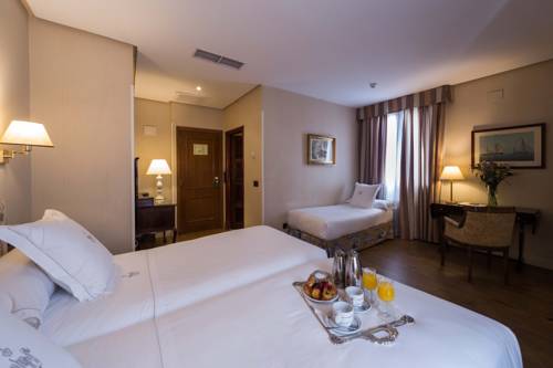 Habitación triple del hotel Principe Pio