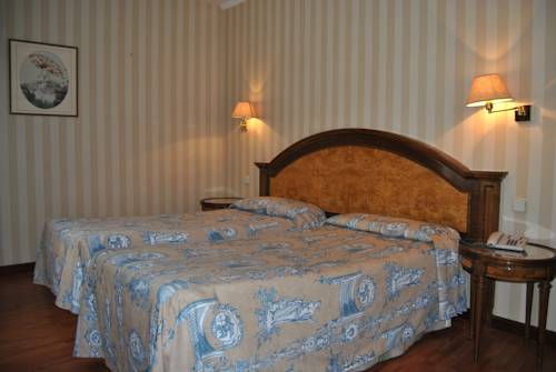 Habitación doble 2 camas del hotel Principe Pio. Foto 1