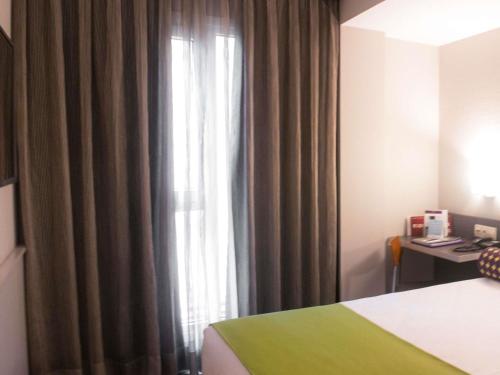 Habitación Individual Estándar del hotel Mercure Madrid Centro. Foto 4