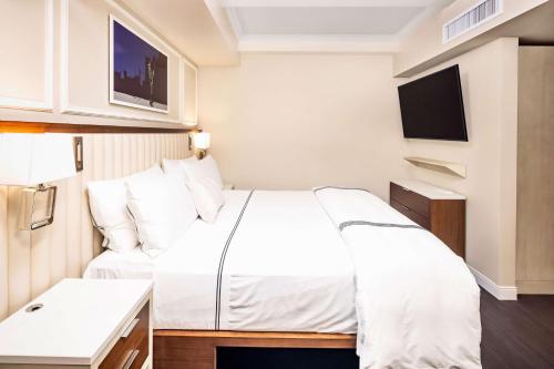 Estudio con cama extragrande del hotel Hilton Club The Quin New York. Foto 1