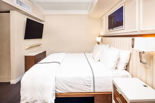 Estudio con cama extragrande del hotel Hilton Club The Quin New York. Foto 3