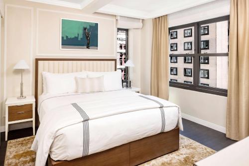 Suite de 1 dormitorio con sofá cama - Cama extragrande del hotel Hilton Club The Quin New York. Foto 2