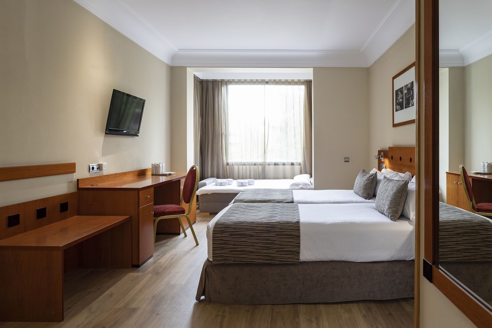 Habitación Cuádruple del hotel Petit Palace Arturo Soria