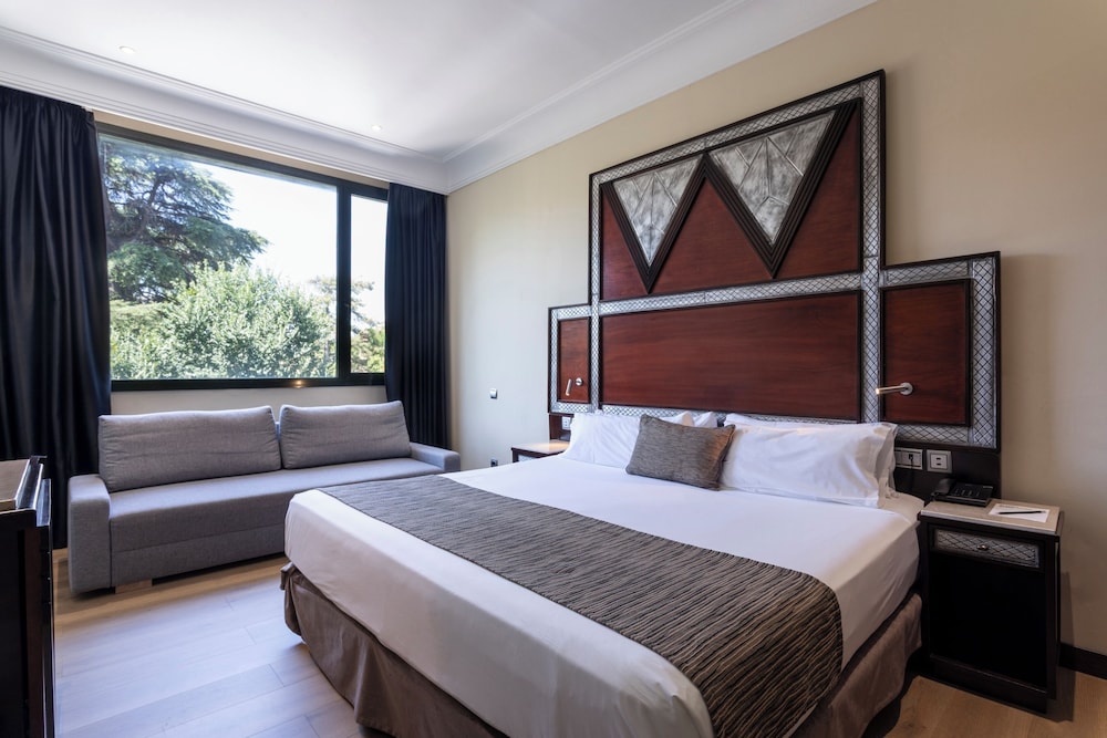 Habitación Cuádruple del hotel Petit Palace Arturo Soria. Foto 6