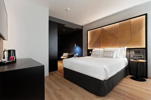 Habitación Melia - Cama grande del hotel Melia Avenida América. Foto 4