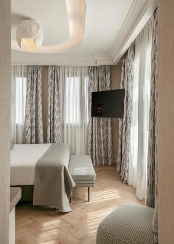 Habitación Deluxe con terraza del hotel Vincci Madrid Centrum. Foto 4