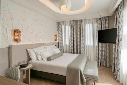 Habitación Deluxe con terraza del hotel Vincci Madrid Centrum. Foto 5