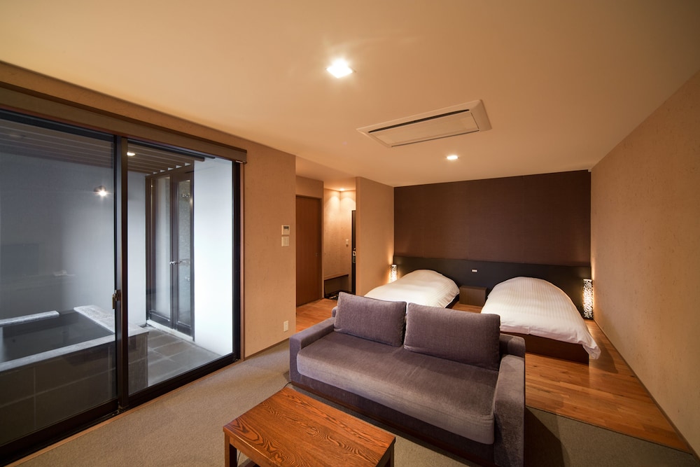 Habitación con 2 camas individuales (w/Private Open - airBath only13yrsAbove) del hotel Aura Tachibana