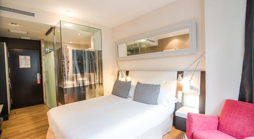 Habitación doble del hotel Petit Palace Chueca. Foto 1