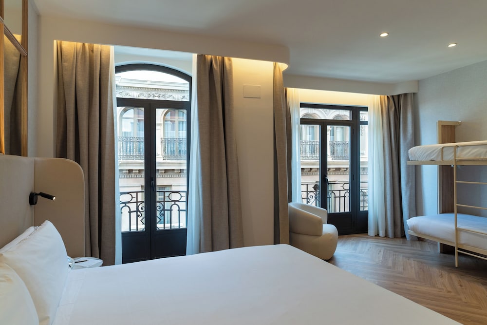 Habitación Cuádruple del hotel Petit Palace Chueca