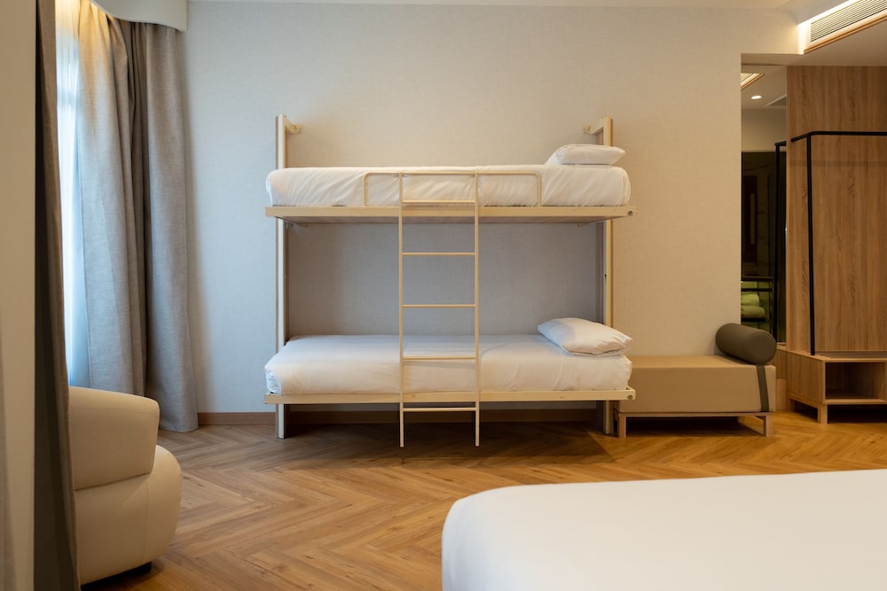Habitación Cuádruple del hotel Petit Palace Chueca. Foto 3