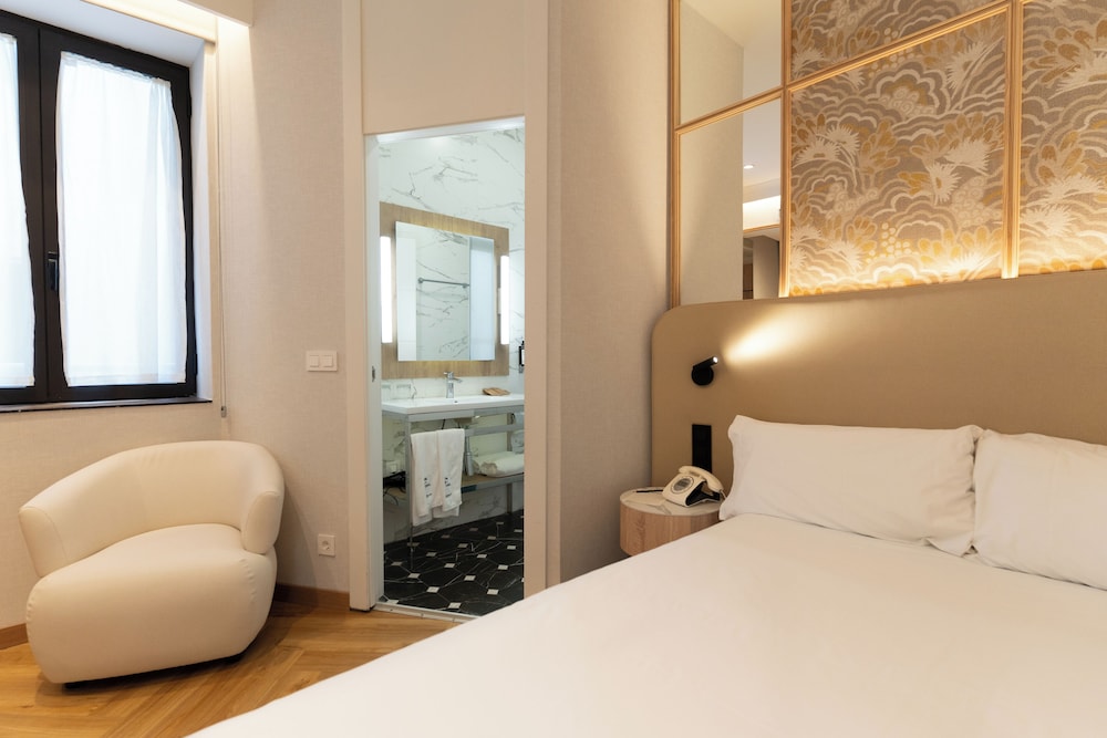 Habitación Individual Deluxe del hotel Petit Palace Chueca. Foto 1