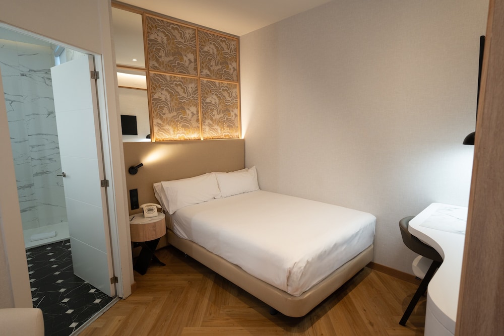Habitación Individual Deluxe del hotel Petit Palace Chueca. Foto 2