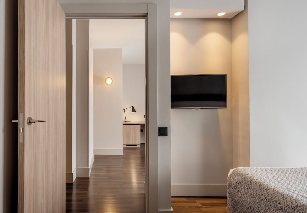 Habitación triple, del hotel Ilunion Suites Madrid. Foto 5