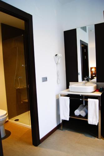 Habitación Triple Confort del hotel Sercotel Plana Parc. Foto 3