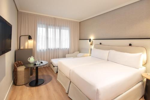 Habitación Triple del hotel Madrid Alameda Aeropuerto, Affiliated By Meliá. Foto 1