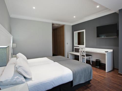 Habitación Doble - 1 o 2 camas del hotel Uve Alcobendas. Foto 10