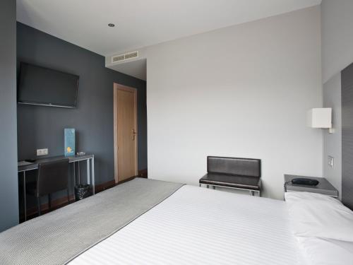 Habitación Doble - 1 o 2 camas del hotel Uve Alcobendas. Foto 12