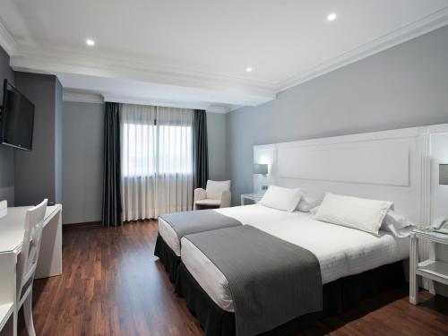 Habitación Doble - 1 o 2 camas del hotel Uve Alcobendas. Foto 14