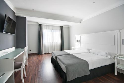 Habitación Doble - 1 o 2 camas del hotel Uve Alcobendas. Foto 16