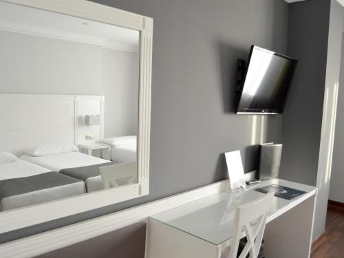 Habitación Triple del hotel Uve Alcobendas. Foto 1