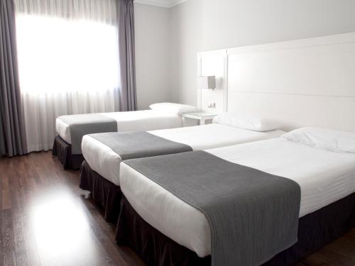 Habitación Triple del hotel Uve Alcobendas. Foto 5