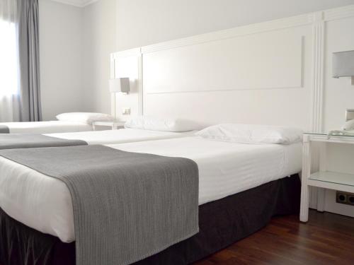Habitación Triple del hotel Uve Alcobendas. Foto 6