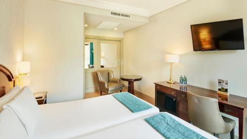 Habitación Doble - 2 camas del hotel Sercotel Gran Conde Duque. Foto 1