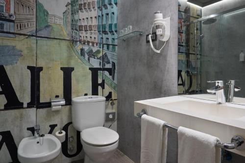 Habitación Doble con cama supletoria - 1 o 2 camas del hotel Puerta De Toledo. Foto 7