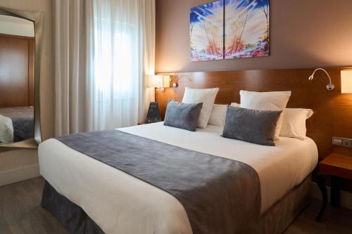 Habitación Doble - 1 o 2 camas del hotel Puerta De Toledo. Foto 2