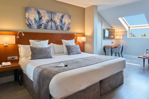 Habitación Doble Superior - 1 o 2 camas del hotel Puerta De Toledo. Foto 5