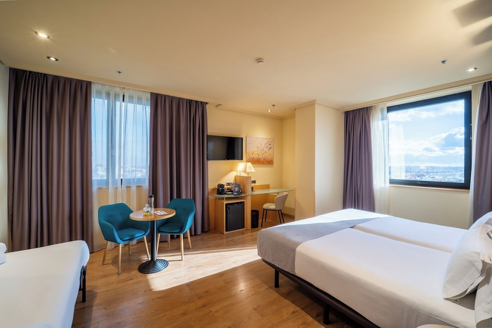 Habitación Triple del hotel Abba Madrid
