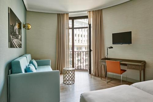 Habitación Cuádruple con vistas a la ciudad del hotel Regente. Foto 1