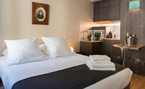 Habitación Deluxe del hotel Helzear Champs Elysées. Foto 3
