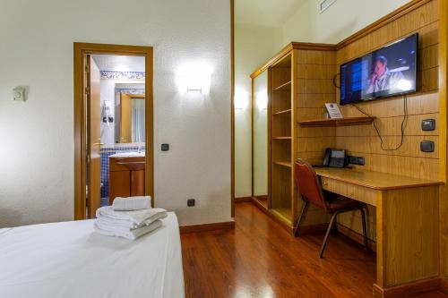 Habitación Doble Económica - 1 o 2 camas del hotel Negresco Gran Vía. Foto 10