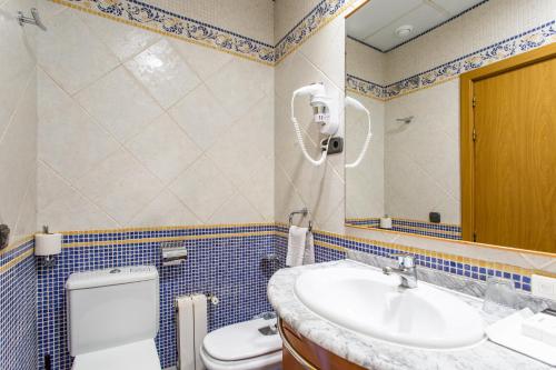 Habitación Doble Económica - 1 o 2 camas del hotel Negresco Gran Vía. Foto 26