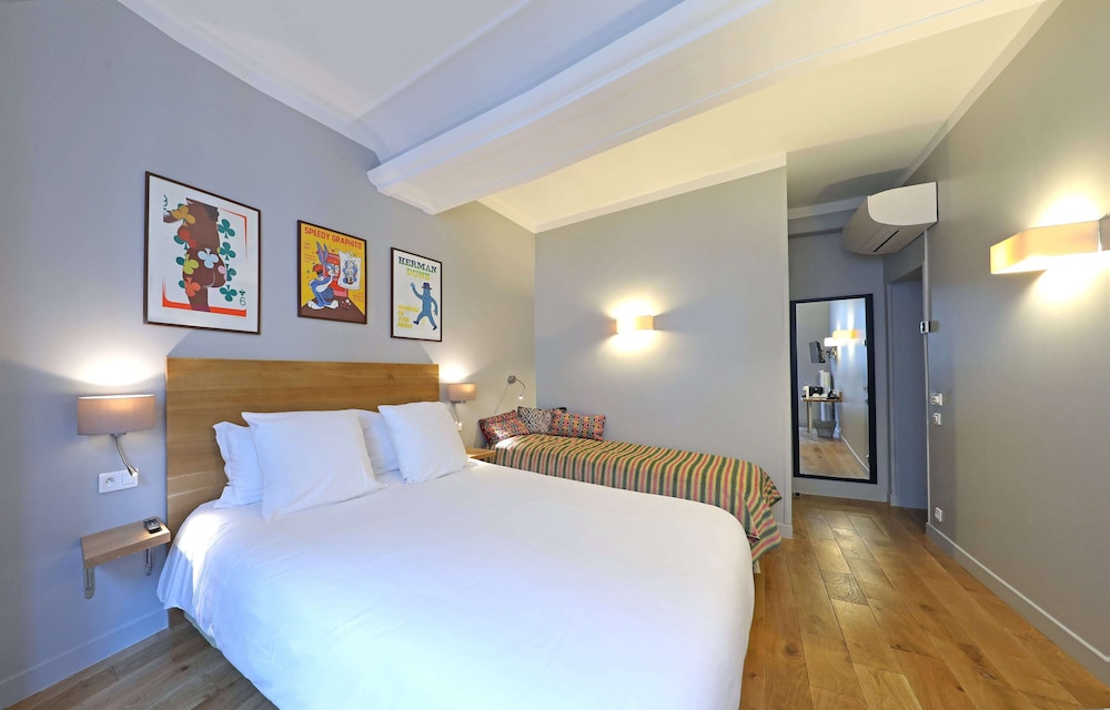 Habitación Triple Confort del hotel Louvre Richelieu. Foto 3