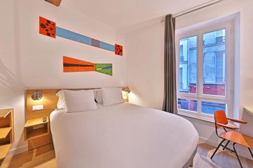 Habitación Doble Confort del hotel Louvre Richelieu. Foto 1