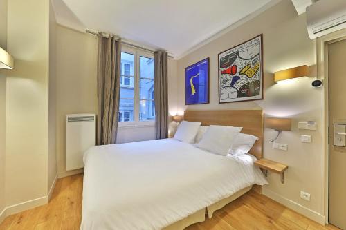 Habitación Doble Confort del hotel Louvre Richelieu. Foto 3