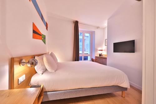 Habitación Doble Confort del hotel Louvre Richelieu. Foto 8