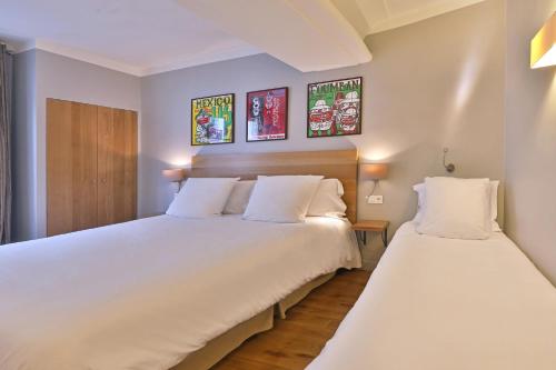 Habitación Triple Confort del hotel Louvre Richelieu