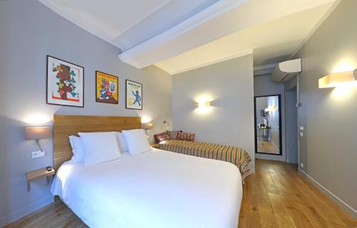 Habitación Triple Confort del hotel Louvre Richelieu. Foto 3