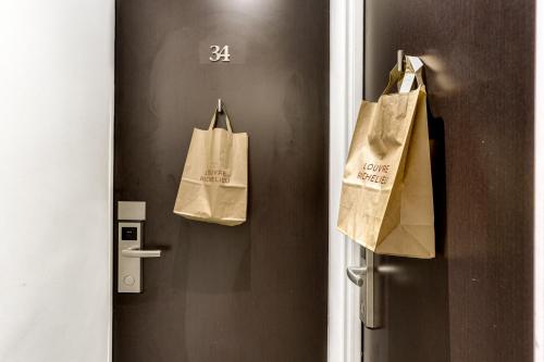 Habitación Triple Confort del hotel Louvre Richelieu. Foto 5