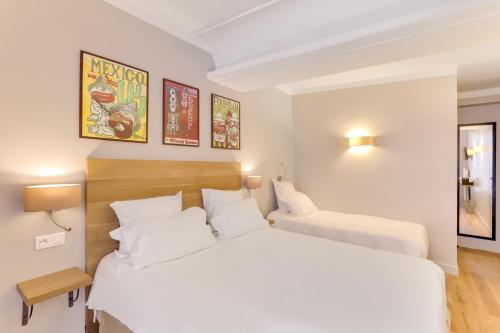 Habitación Triple Confort del hotel Louvre Richelieu. Foto 9