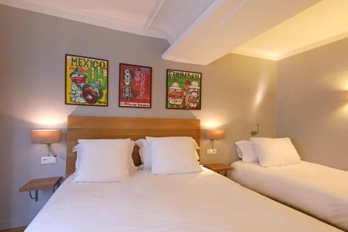 Habitación Triple Confort del hotel Louvre Richelieu. Foto 15