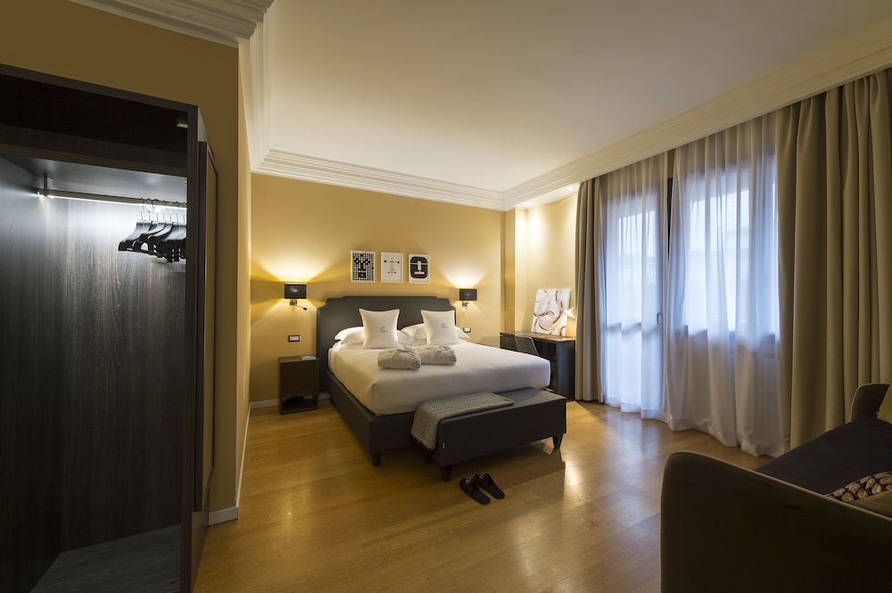 Habitación Triple Deluxe del hotel Elizabeth Lifestyle. Foto 1