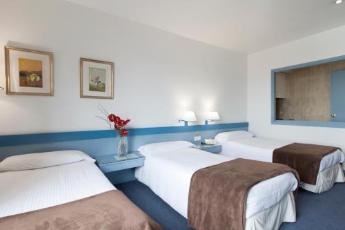 Estudio Triple Estándar del hotel Espahotel Plaza De España. Foto 4