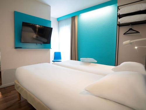 Habitación Estándar - 2 camas individuales del hotel Ibis Styles Quimper. Foto 1